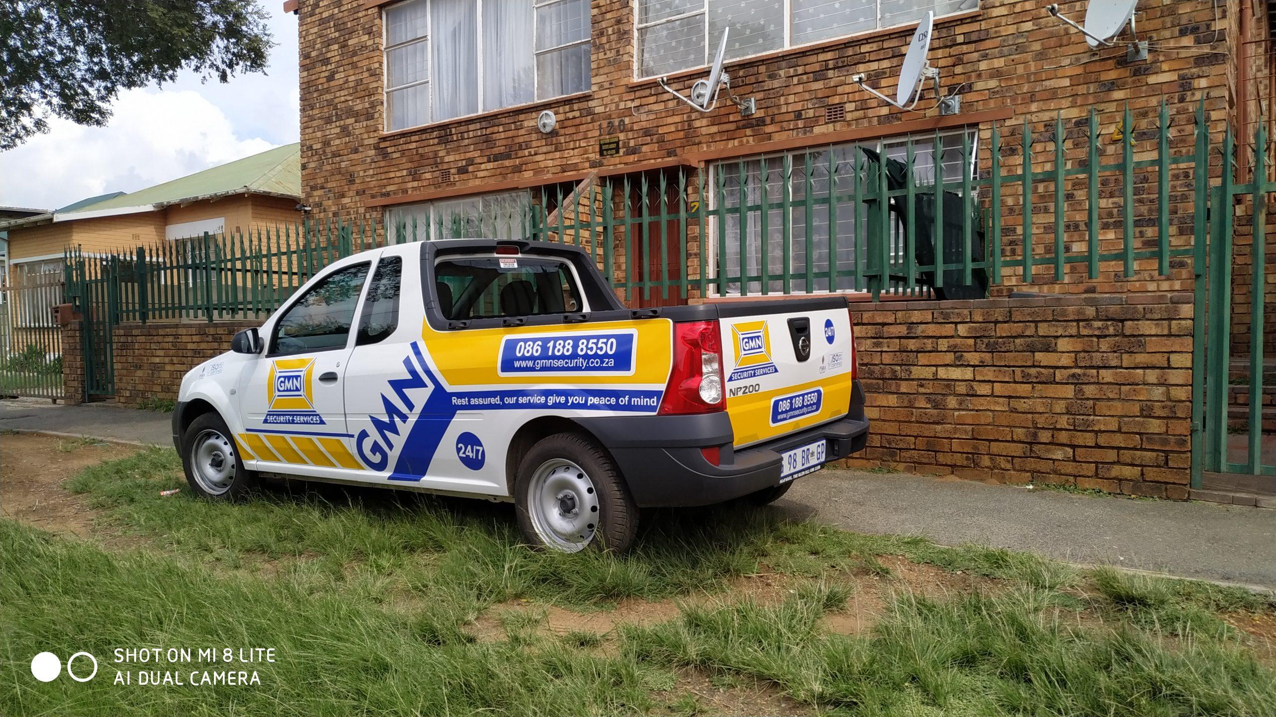 Custom vehicle branding by Masproclean Branding and Signage, featuring vibrant graphics and logos on a vehicle designed for effective mobile advertising