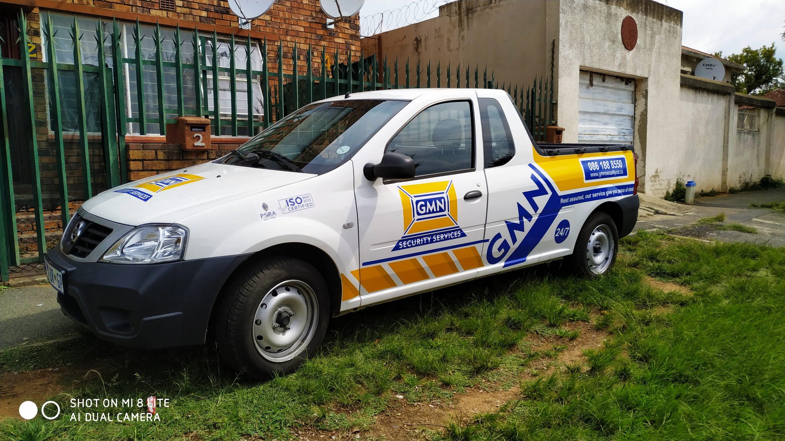 Custom vehicle branding by Masproclean Branding and Signage, featuring vibrant graphics and logos on a vehicle designed for effective mobile advertising.