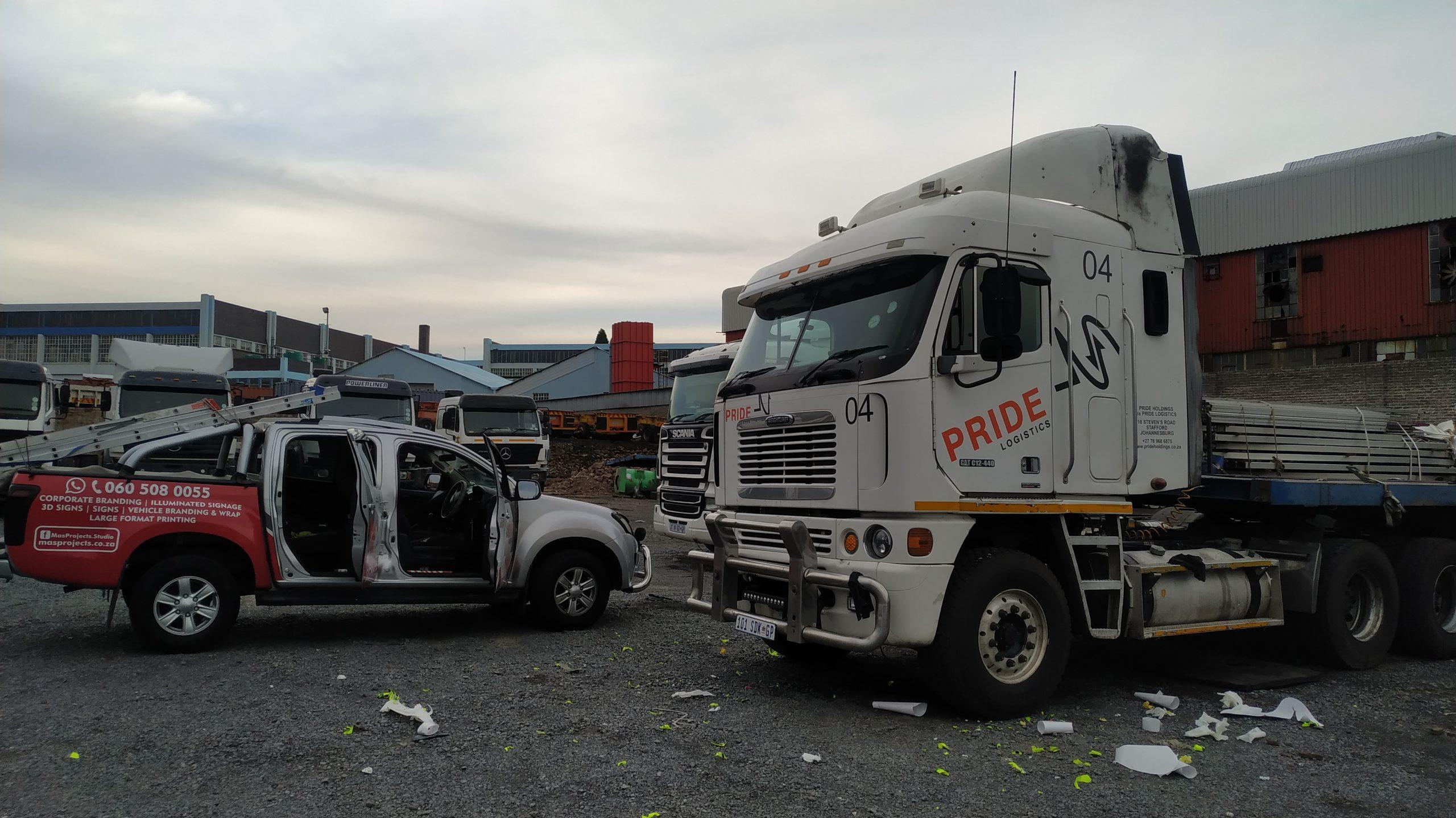 Professional truck branding by Masproclean Branding and Signage, showcasing vibrant graphics and company logos to maximize mobile advertising and enhance brand awareness
